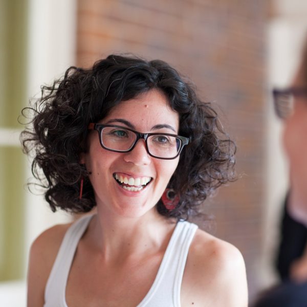 Woman with glasses smiling