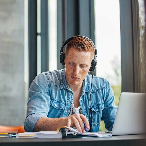 square-man-headphones-studying