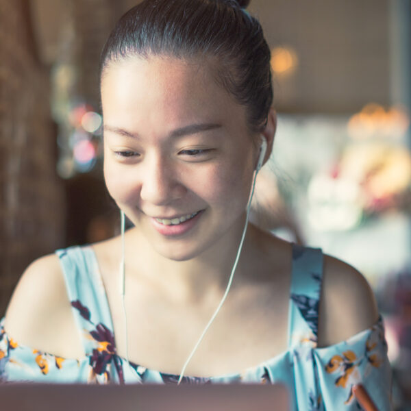 young beautiful girl using laptop