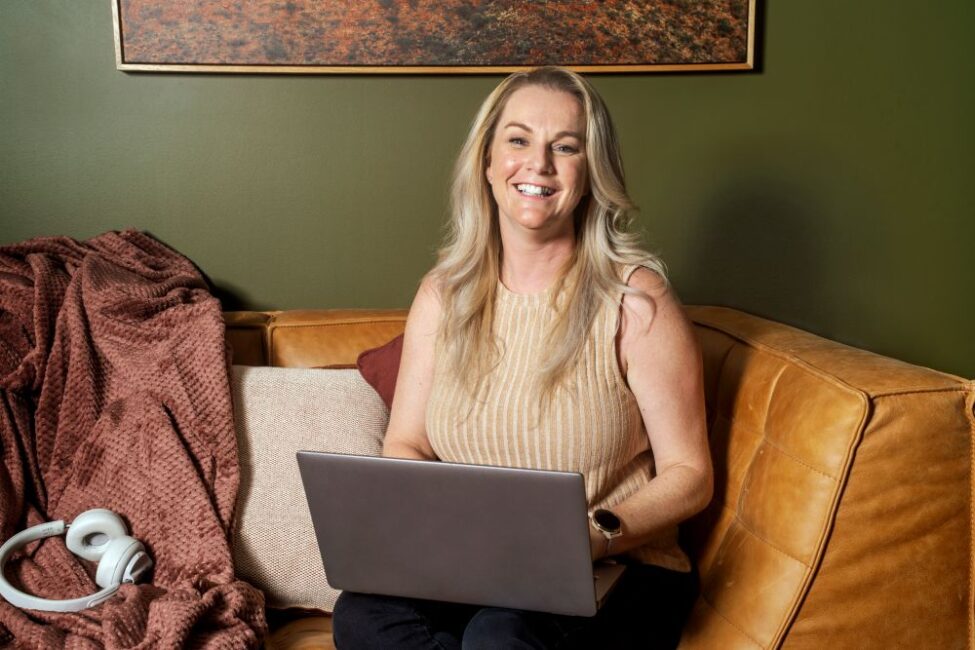 Student, Em Watson, working on laptop